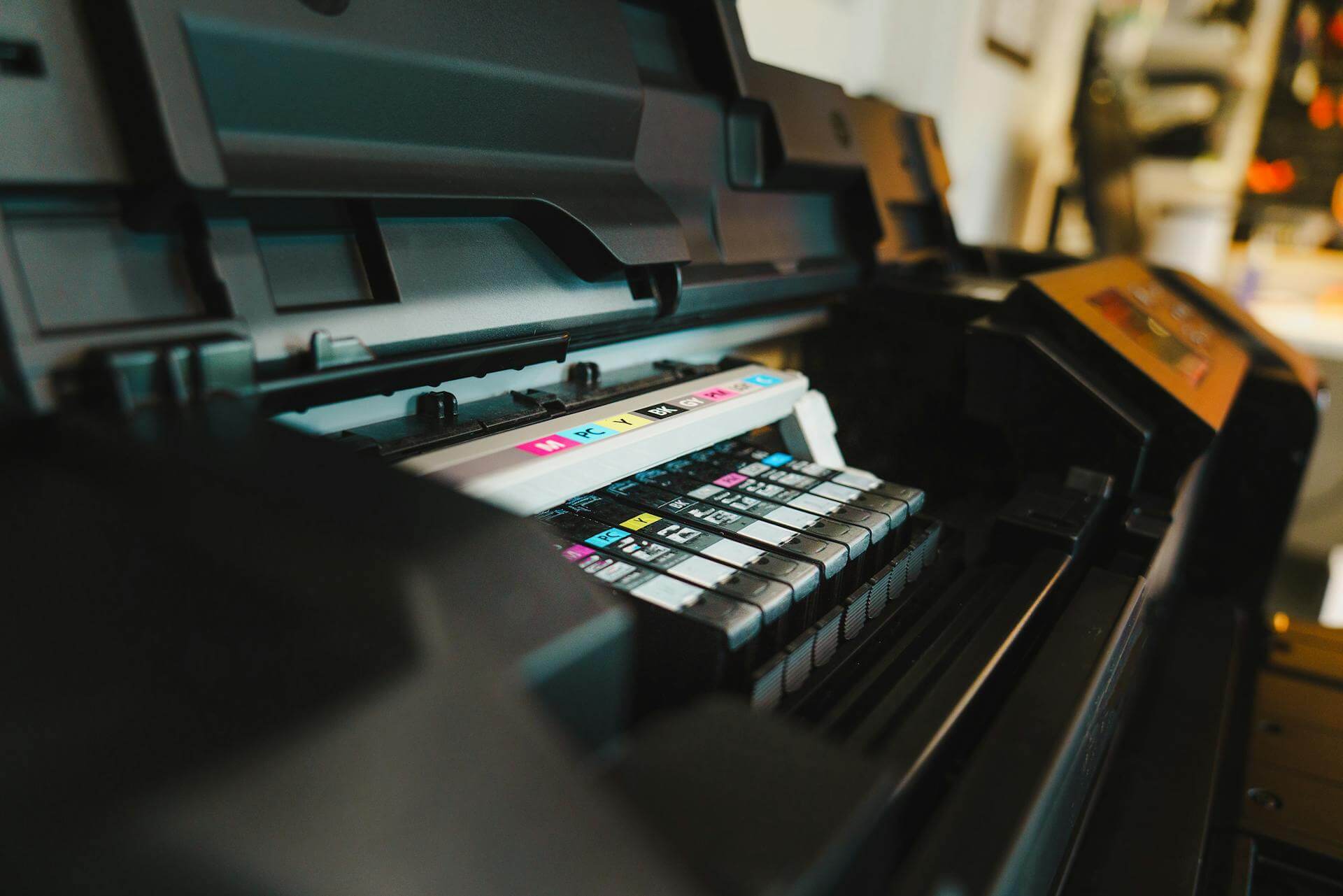 Close-up of inkjet printer ink cartridges. Corporate printer rental.