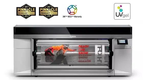 Canon UVgel large format printer printing snowboard graphic on roll media. Features 3M MCS™ Warranty.