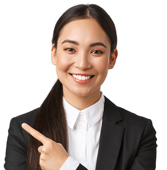 Smiling businesswoman pointing to space for text
