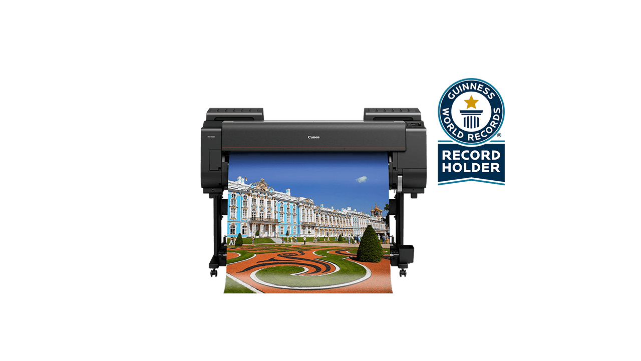 Canon imagePROGRAF large format printer printing a panoramic photo of a palace.