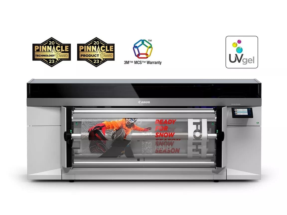Canon Colorado M3 large-format printer printing a vibrant snow sports design. UVgel technology.