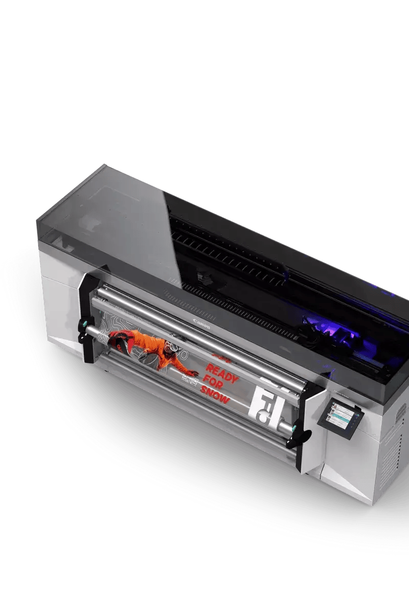 Canon Colorado M5 large format printer printing a vibrant snowboard graphic. "Ready for Snow" text visible.