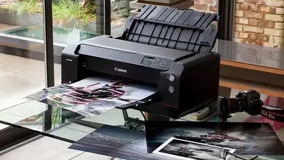 Canon PIXMA PRO-200 large format photo printer printing a vibrant image.
